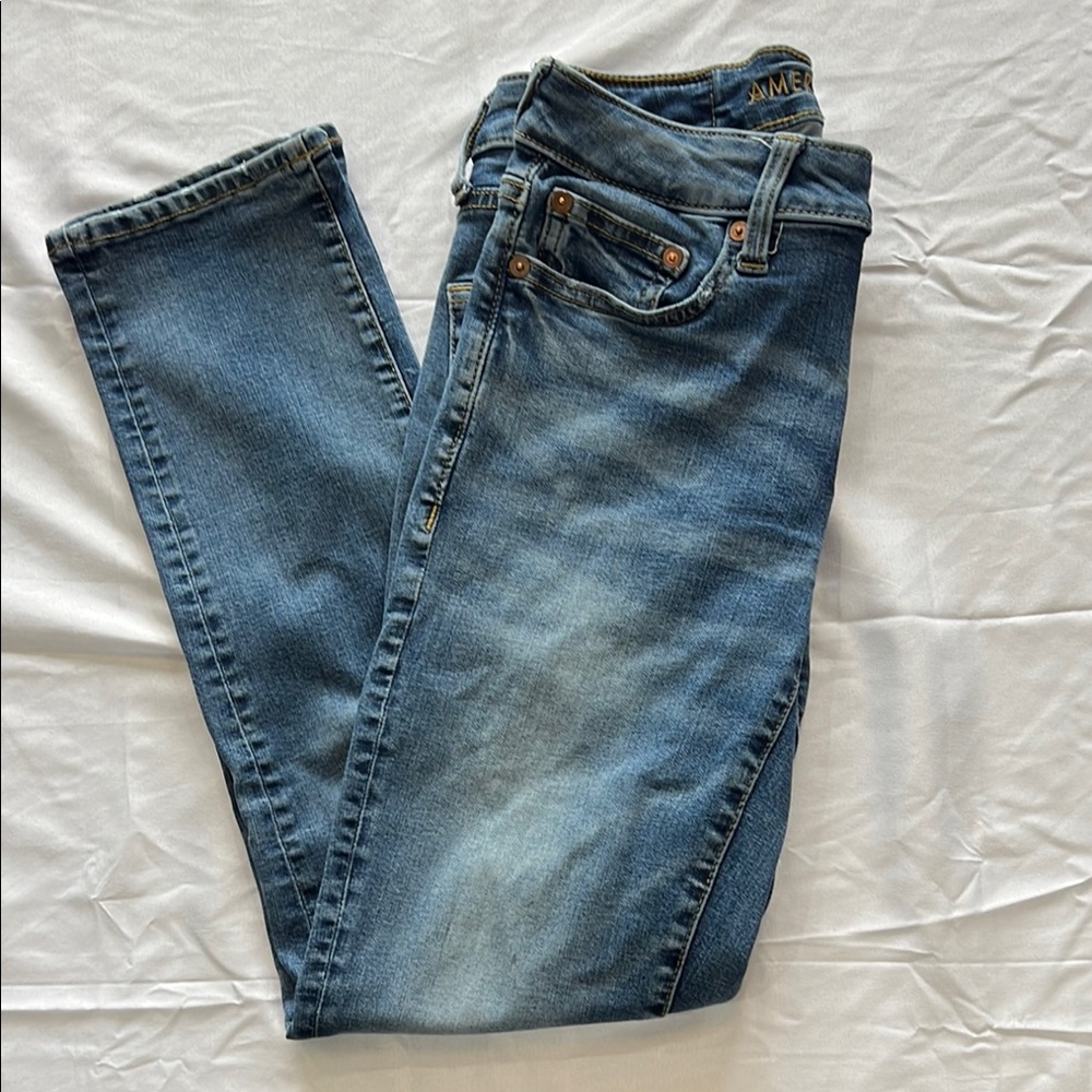 American Eagle Outfitters Skinny Blue Jeans with Faded Wash